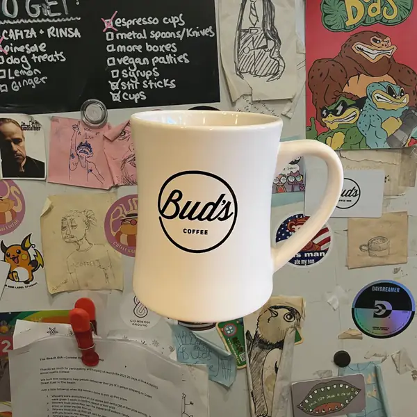 A white 16 oz diner mug with the round Bud's Coffee logo